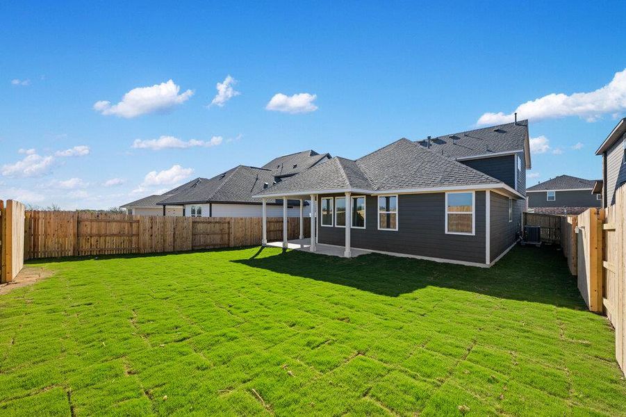 Exterior details and patio area of a home in Patterson Ranch, Georgetown (Image 24).