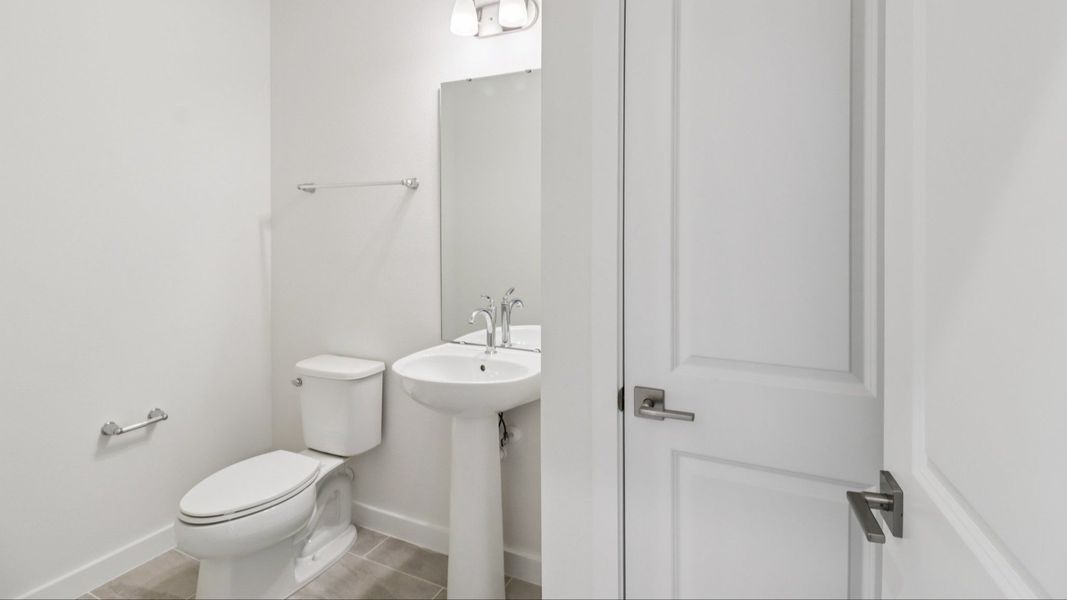 Guest Bath in the Monterey End Townhome by DRB Homes - Cyrene at Harmony in St Cloud FL