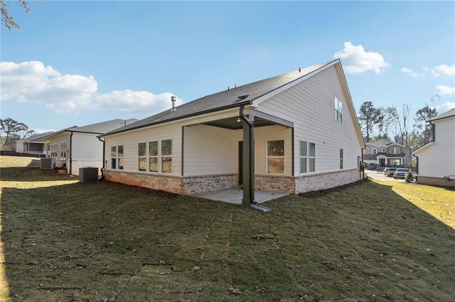 Exterior details and patio area of a home in Westmont Preserve, Powder Springs (Image 28).