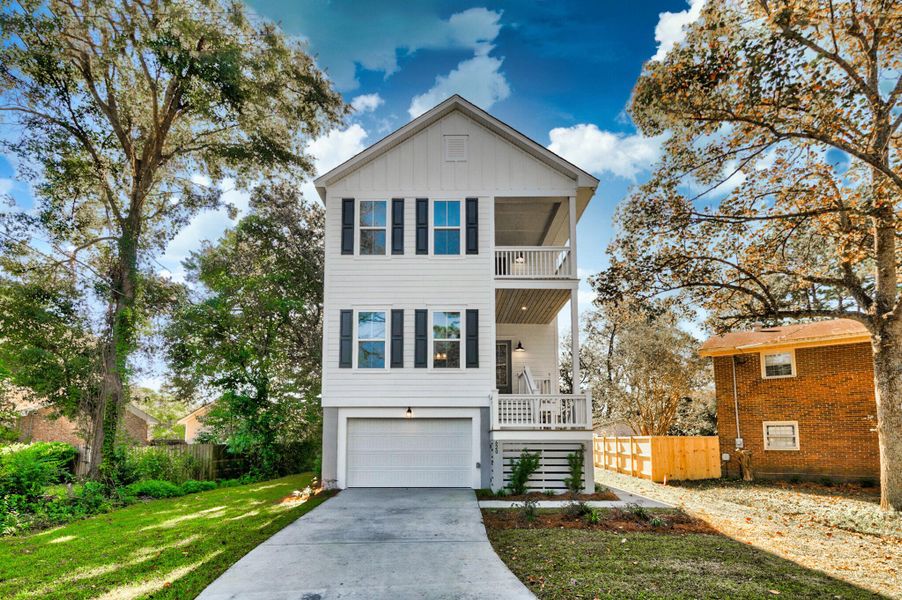 Front exterior of a new home in , Charleston, SC, highlighting curb appeal (Image 1).