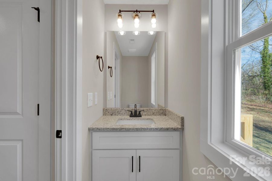 Convenient main-level half bath for guests