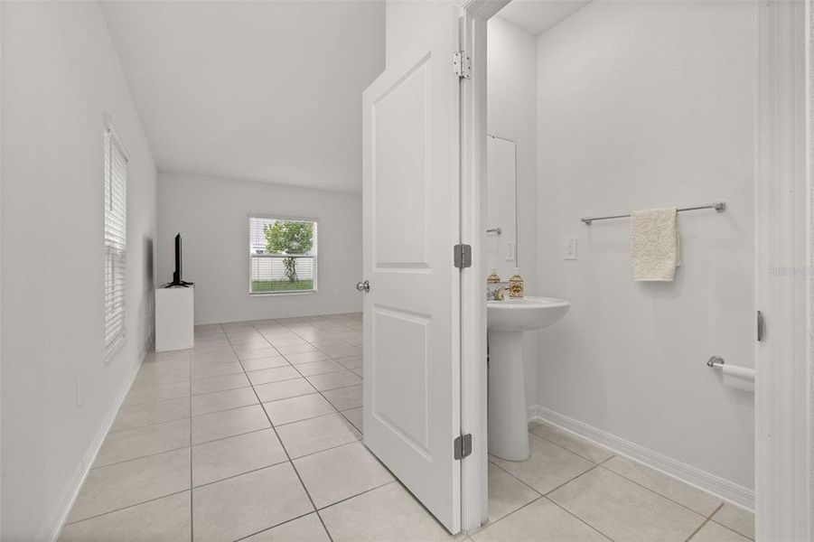 Furnished interior view inside a new home in Peace Creek Reserve, Winter Haven (Image 13).