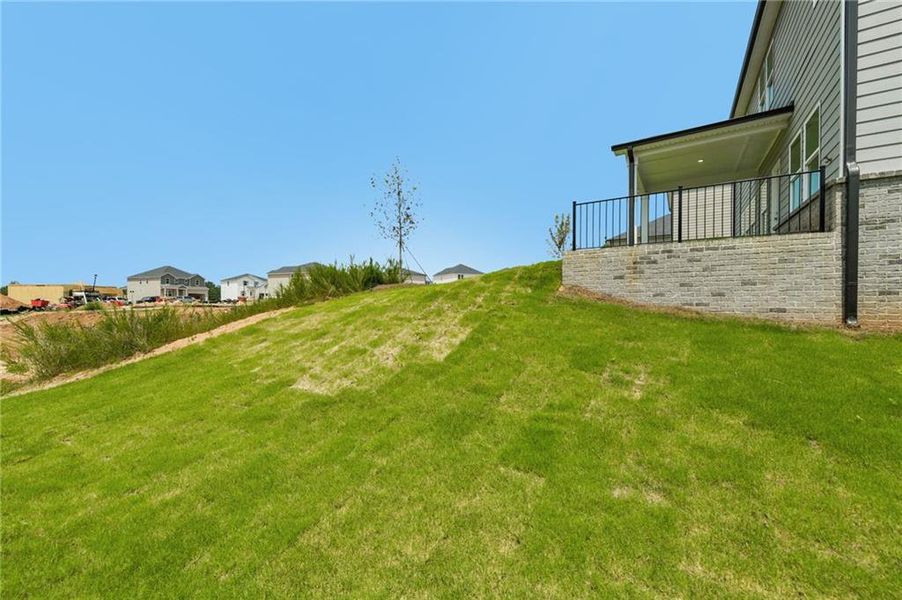 Exterior details and patio area of a home in Preserve at Mountain Creek, Pendergrass (Image 20).