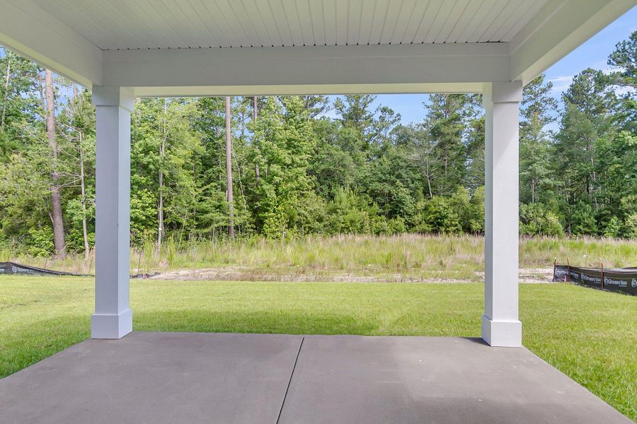 Exterior details and patio area of a home in Tidewater at Lakes of Cane Bay, Summerville (Image 3). Exterior details and patio area of a home in Tidewater at Lakes of Cane Bay, Summerville (Image 3).
