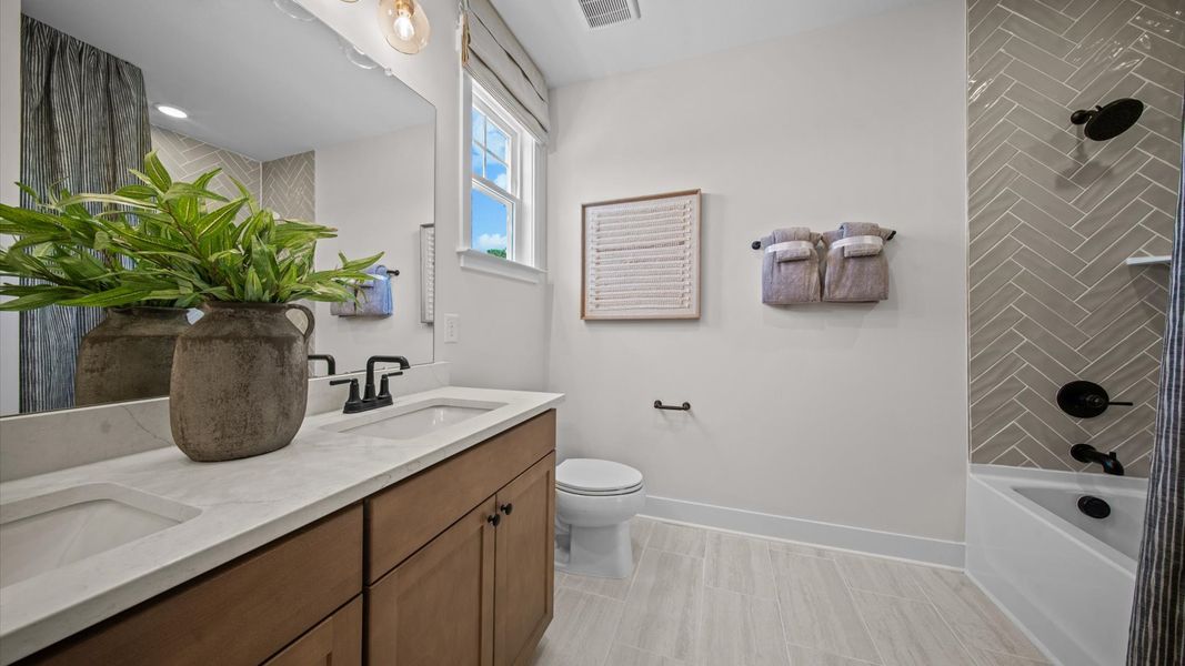 Representative furnished interior of a home built from the Harlow by DRB Homes in Bayberry, Raleigh (Image 36).