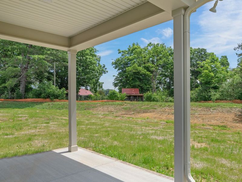 Exterior details and patio area of a home in Woods Crossing, Gallatin (Image 4).