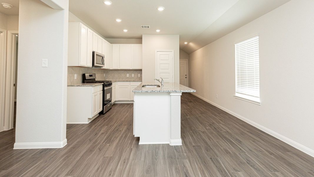 Family Room to Kitchen and Dining Area