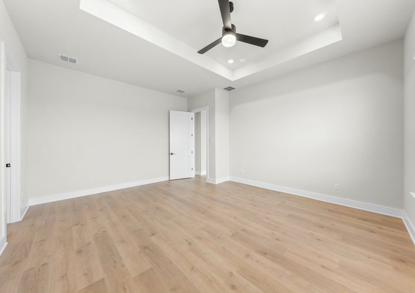 The spacious master suite has plenty of space for your king-sized furniture.