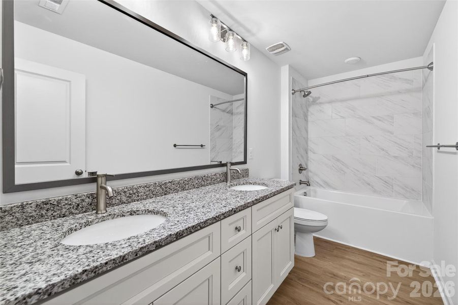 Furnished interior view inside a new home in , Charlotte (Image 13).