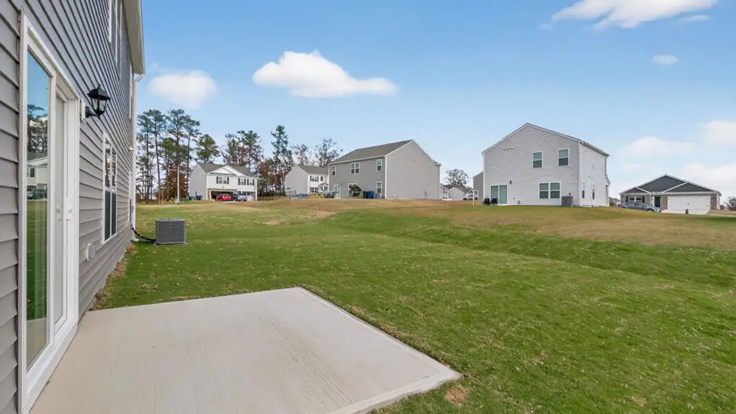 Exterior details and patio area of a home in Madeline Farm, New Bern (Image 4).