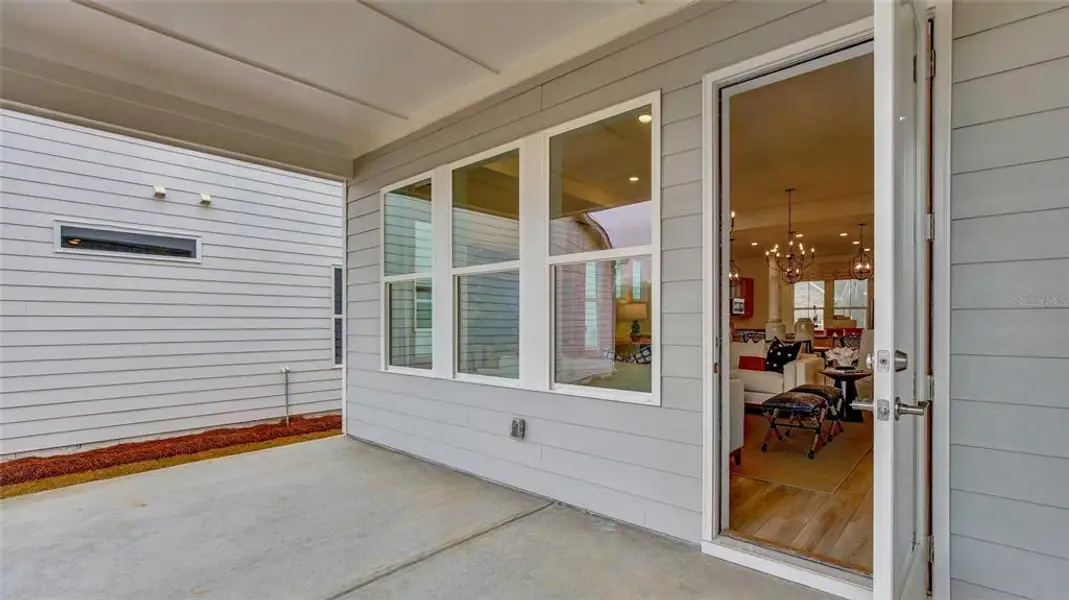 Exterior details and patio area of a home in , Deland (Image 3).