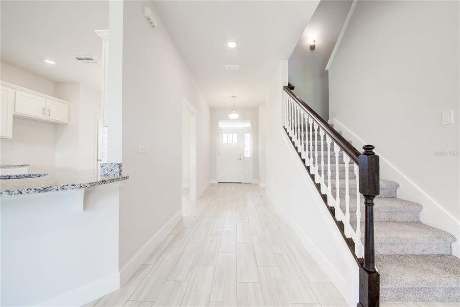 Spacious, unfurnished interior of a new home in Aviary at Rutland Ranch, Parrish (Image 18).