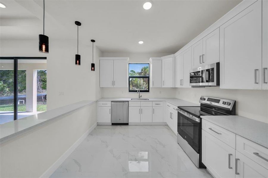 Furnished interior view inside a new home in , Port Charlotte (Image 5).