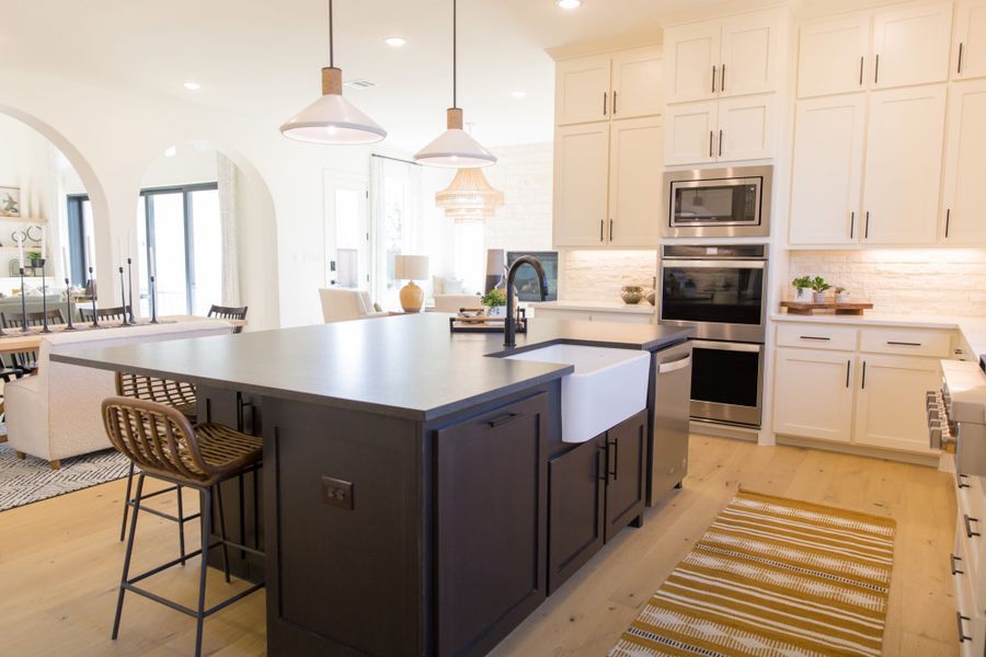 Representative furnished interior of a home built from the 7031 by Tradition Homes in Mustang Lakes, McKinney (Image 22). Representative furnished interior of a home built from the 7031 by Tradition Homes in Mustang Lakes, McKinney (Image 22).