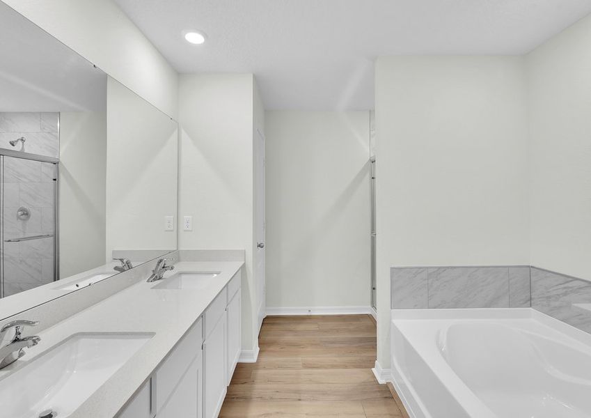 Get ready for your day in the master bathroom