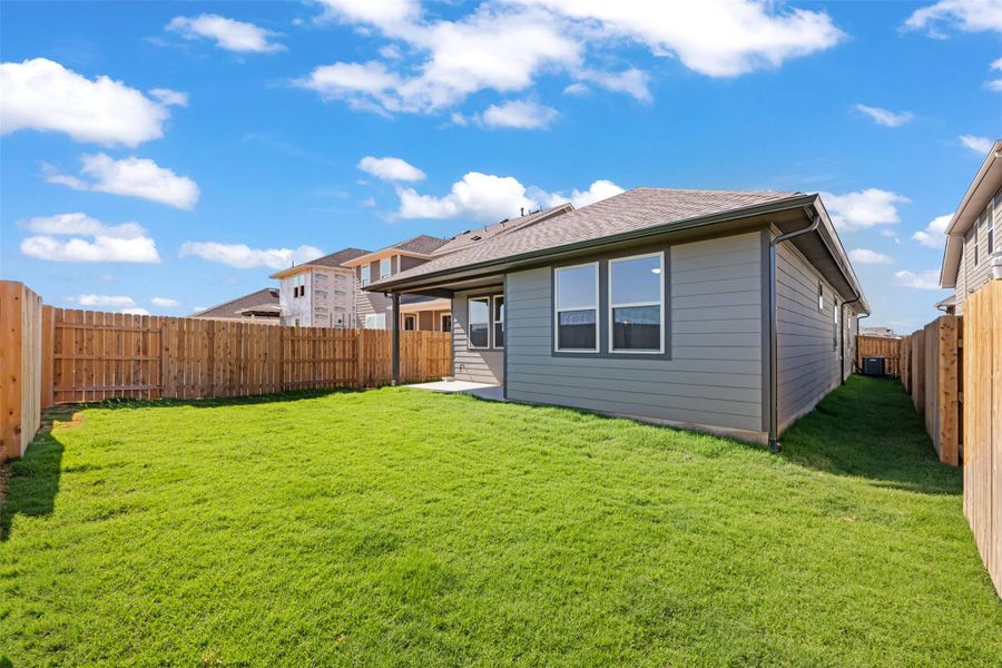 Exterior details and patio area of a home in The Trails at Carmel, Pflugerville (Image 26).