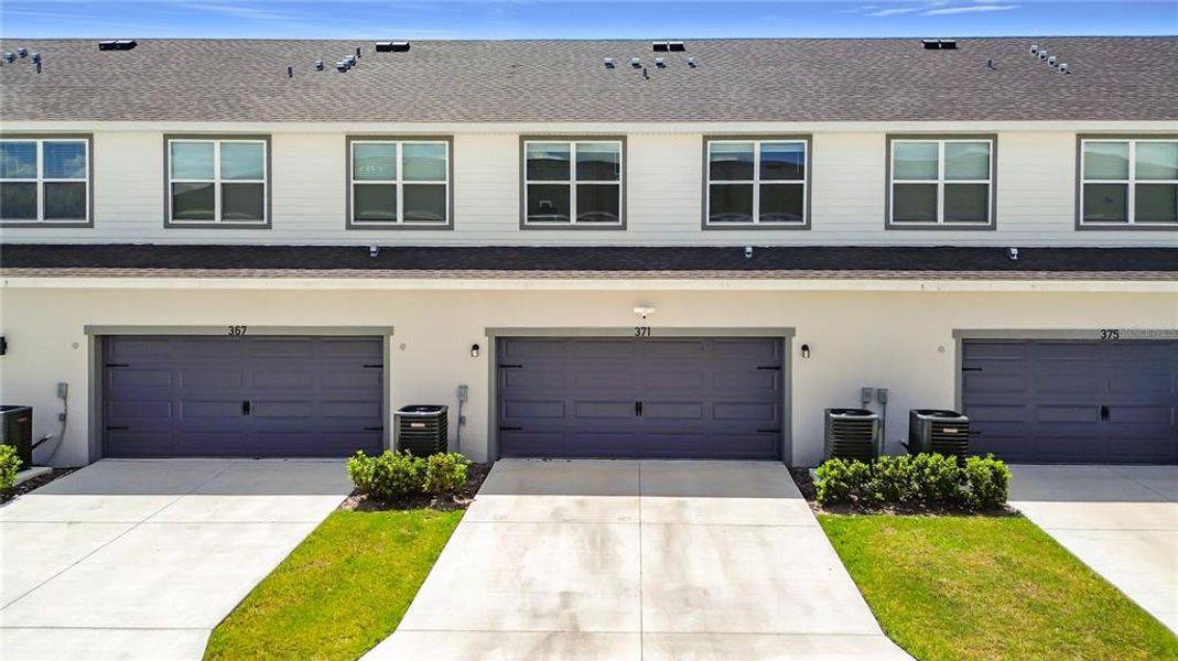 Front exterior of a new home in , St. Cloud, FL, highlighting curb appeal (Image 18). Front exterior of a new home in , St. Cloud, FL, highlighting curb appeal (Image 18).