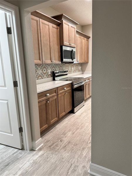 Furnished interior view inside a new home in , Dade City (Image 9).