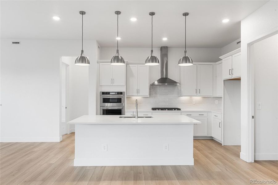 Furnished interior view inside a new home in Hilltop at Inspiration, Aurora (Image 10).