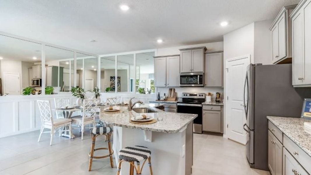 Furnished interior view inside a new home in Star Farms at Lakewood Ranch, Bradenton (Image 5).