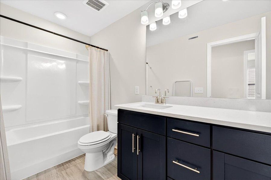 Furnished interior view inside a new home in Jasmine Point at Lakes of Cane Bay, Summerville (Image 7).