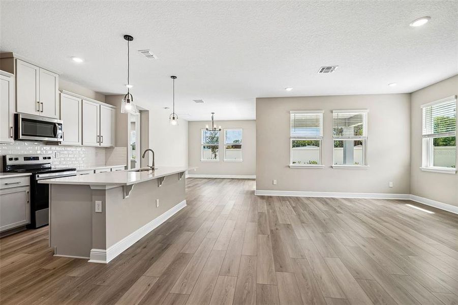 Furnished interior view inside a new home in Legends Preserve - Signature Series, Daytona Beach (Image 15).