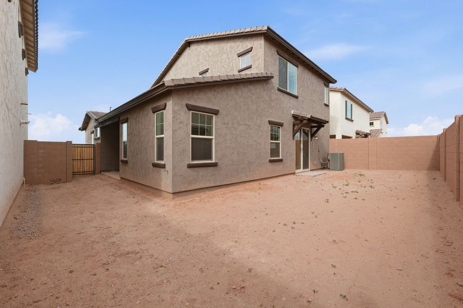 Exterior details and patio area of a home in Hawes Crossing, Mesa (Image 4).