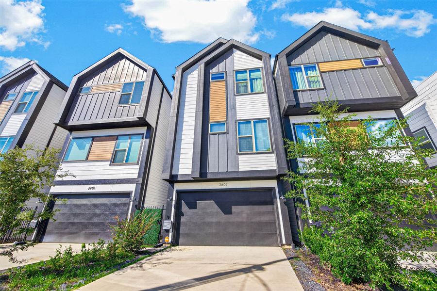 Front exterior of a new home in , Houston, TX, highlighting curb appeal (Image 25).