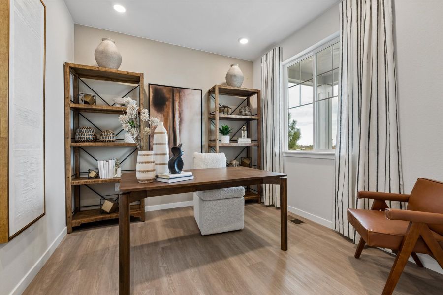 A room with a table and chairs. A room with a table and chairs.