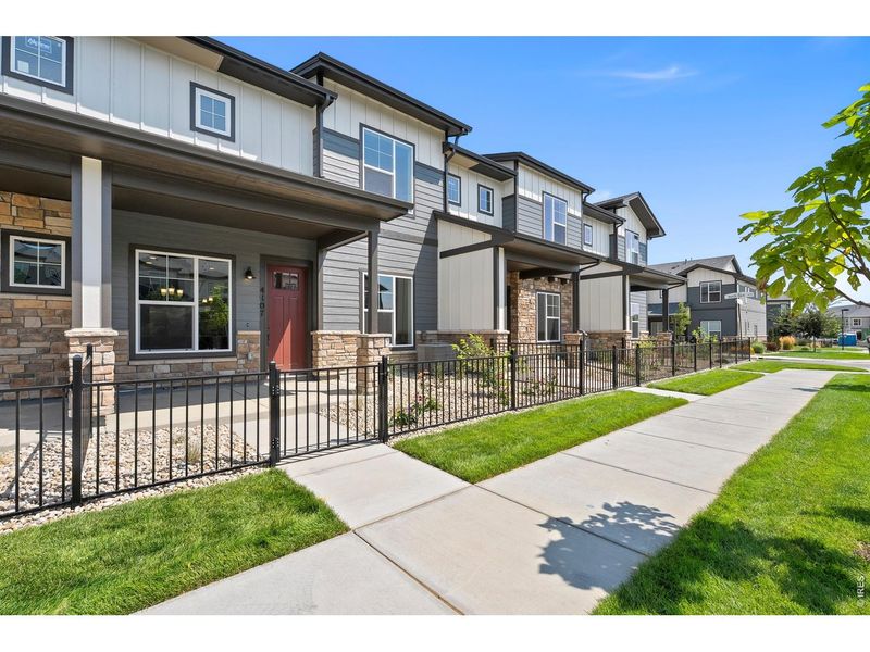 Exterior details and patio area of a home in The Lakes at Centerra, Loveland (Image 16).