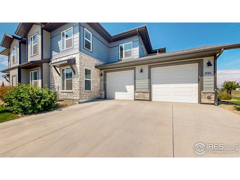 Attached oversized one car garage has added storage that will stay with the house