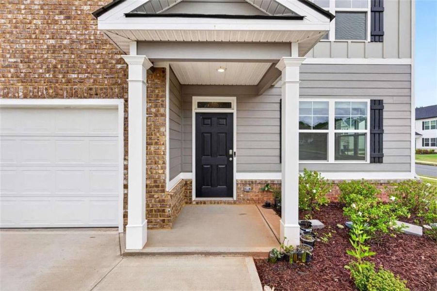 Exterior details and patio area of a home in Bailey Glynn, Covington (Image 3).