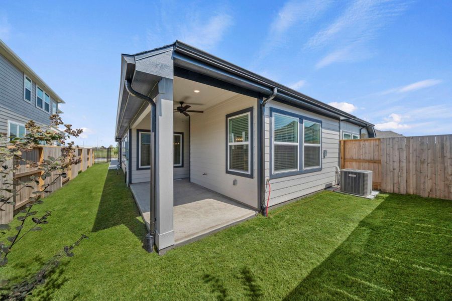 Exterior details and patio area of a home in Meridiana, Manvel (Image 16).