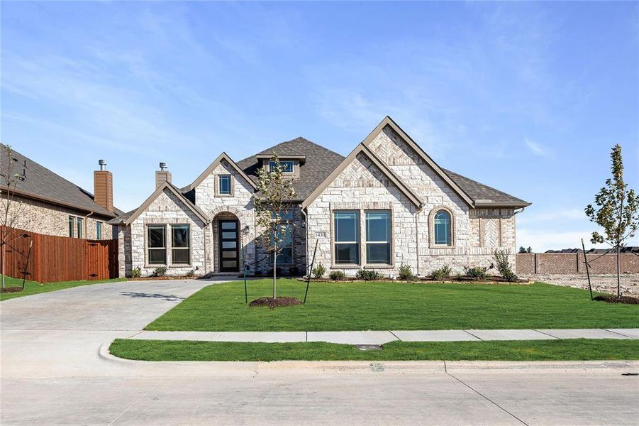 Front exterior of a new home in Villages of Walnut Grove, Midlothian, TX, highlighting curb appeal (Image 2).