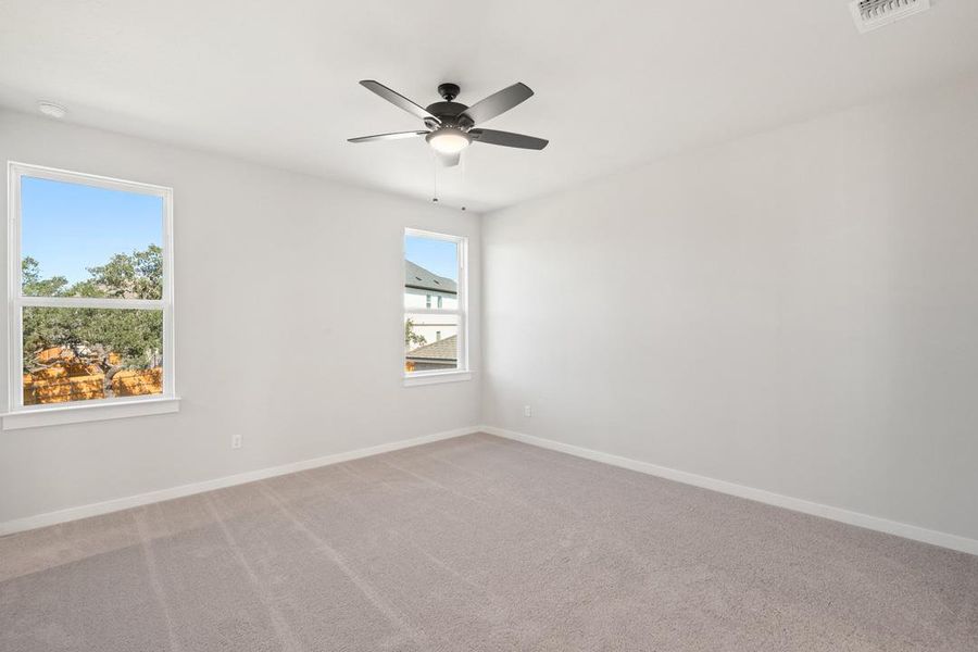 Spacious, unfurnished interior of a new home in Terrace Collection at Heritage, Dripping Springs (Image 28).