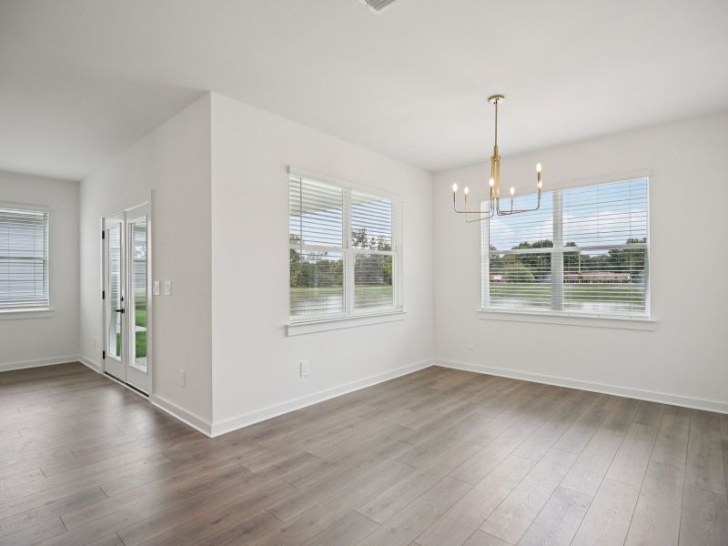 The open-concept floorplan allows for an easy flow between the kitchen and dining areas. The open-concept floorplan allows for an easy flow between the kitchen and dining areas.