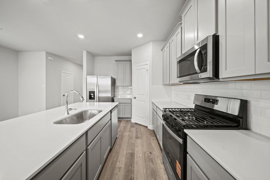 Furnished interior view inside a new home in Valor Park, Bay City (Image 5). Furnished interior view inside a new home in Valor Park, Bay City (Image 5).