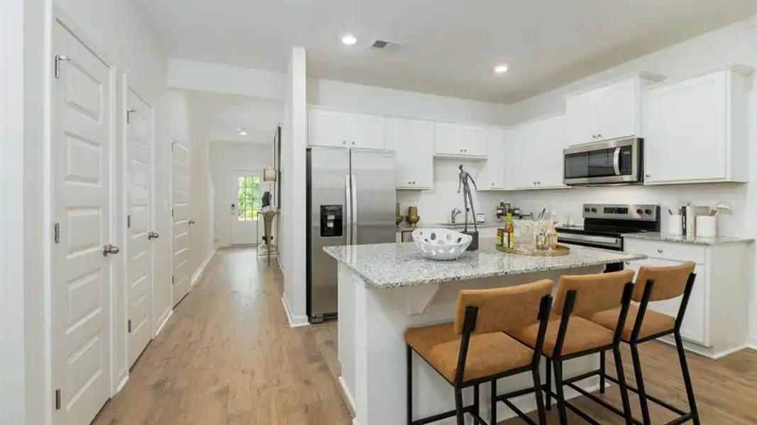 Furnished interior view inside a new home in Towns at Monroe, Atlanta (Image 2). Furnished interior view inside a new home in Towns at Monroe, Atlanta (Image 2).