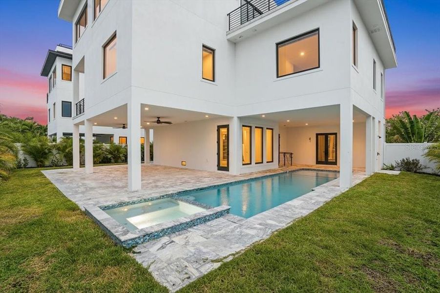 Exterior details and patio area of a home in , Englewood (Image 45).