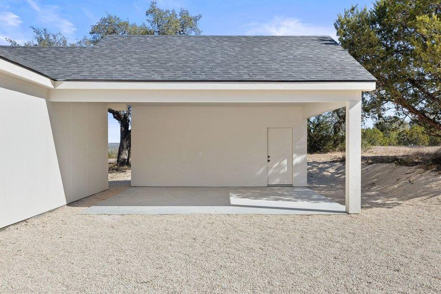 Attached Carport with AC storage area!