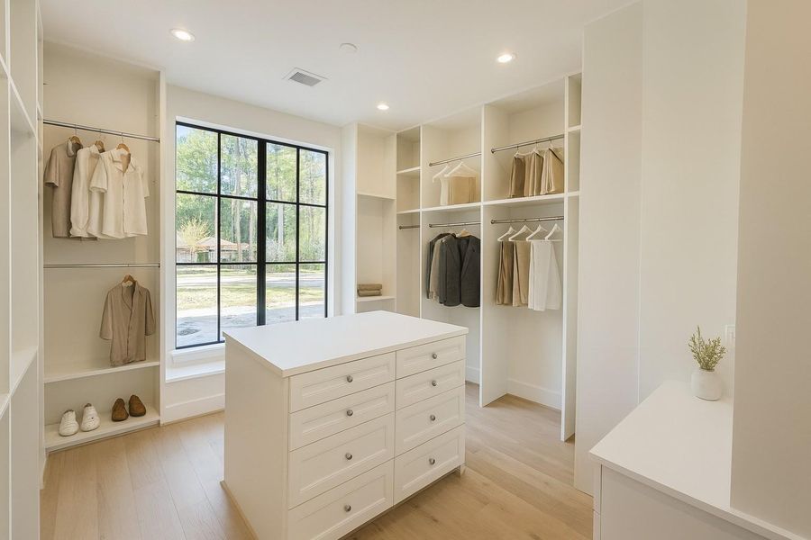 Primary Closet. Professionally rendered/staged photo from actual photo of home.