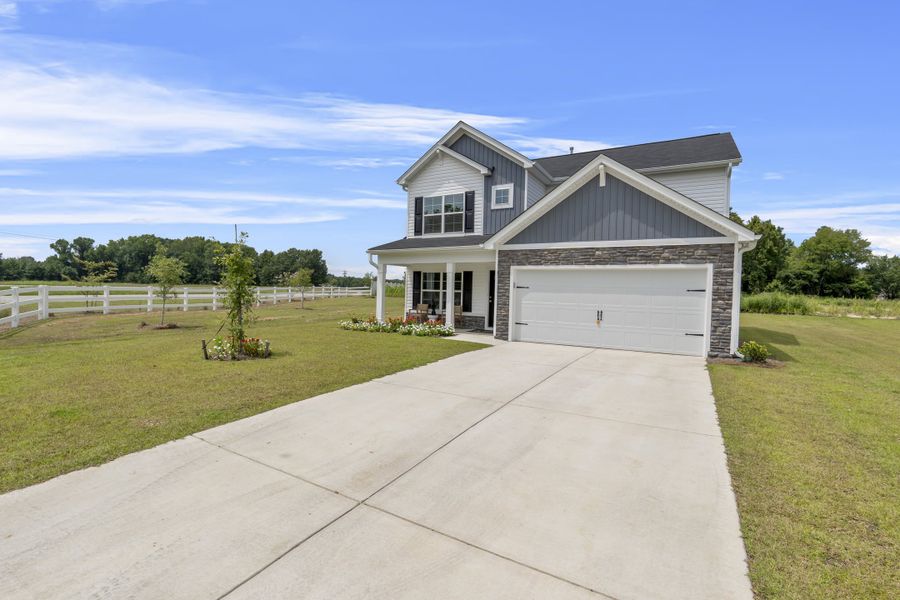 Representative exterior photo of a completed home built from the Myrtle A by McGuinn Homes in Crystal Downs, Sumter, SC (Image 19).