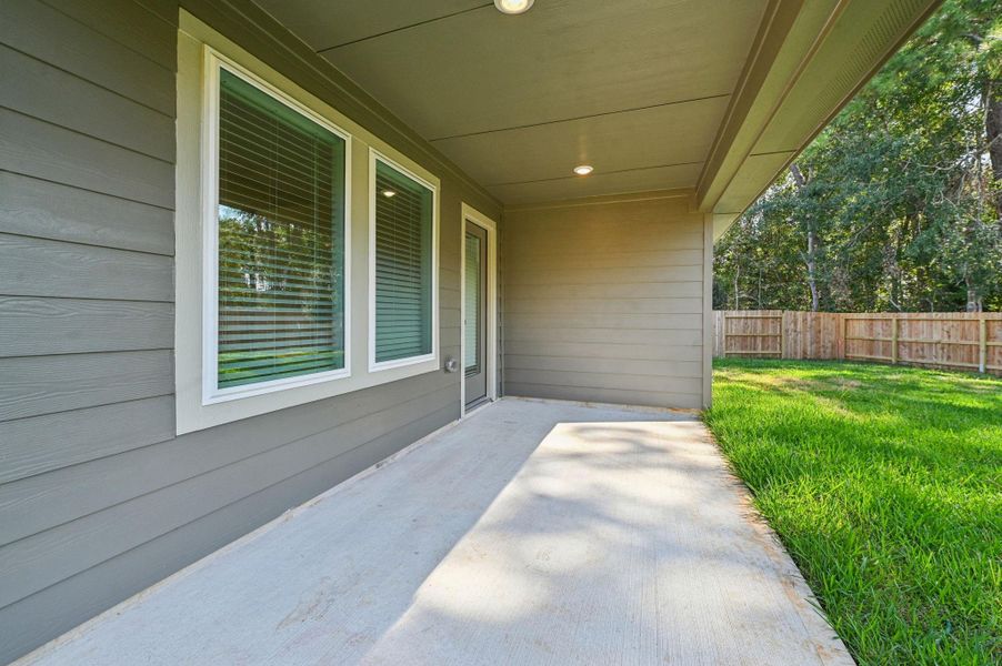 Exterior details and patio area of a home in , Conroe (Image 22).