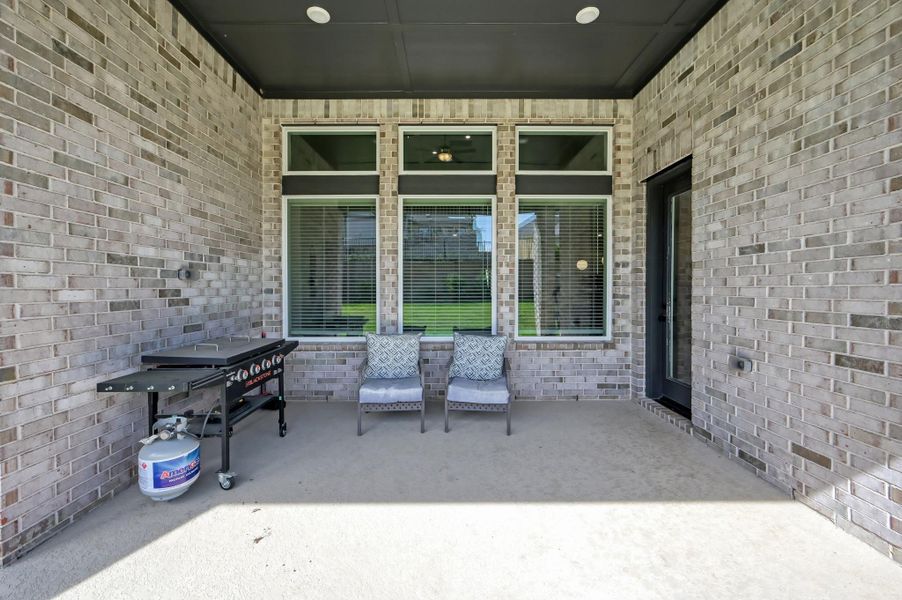 Exterior details and patio area of a home in The Woodlands Hills 60’, Willis (Image 4).