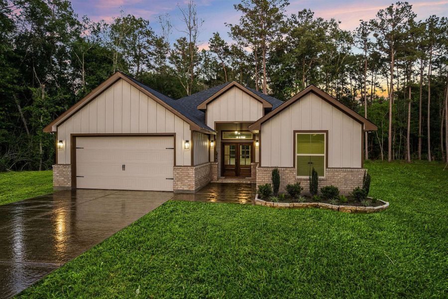 Front exterior of a new home in , Porter, TX, highlighting curb appeal (Image 23).