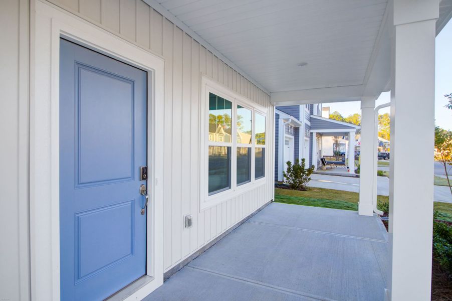 Exterior details and patio area of a home in Homecoming, Ravenel (Image 1).