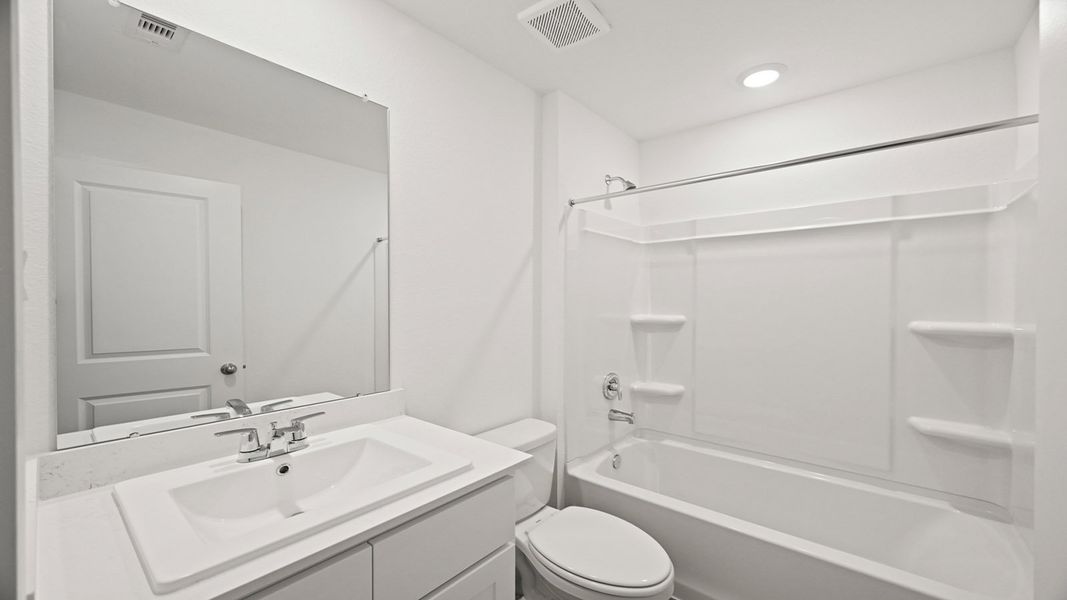 Furnished interior view inside a new home in Westward Pointe, Sealy (Image 4).