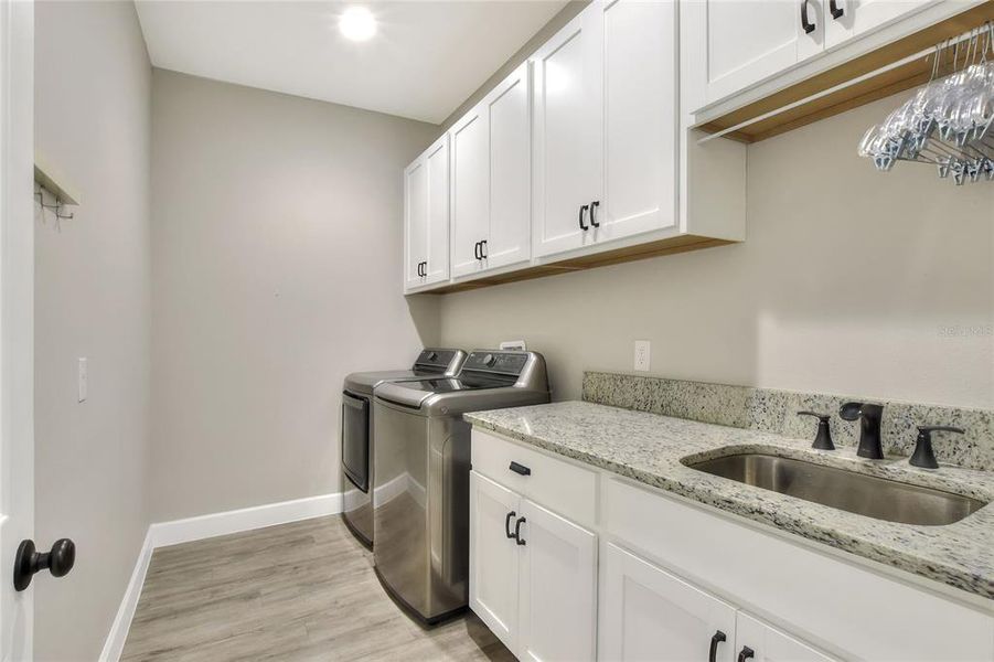 Laundry room, near Half Bath and Garage entry.