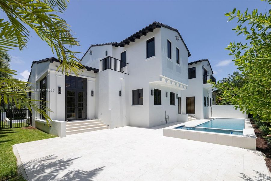 Front exterior of a new home in , Miami Beach, FL, highlighting curb appeal (Image 32). Front exterior of a new home in , Miami Beach, FL, highlighting curb appeal (Image 32).