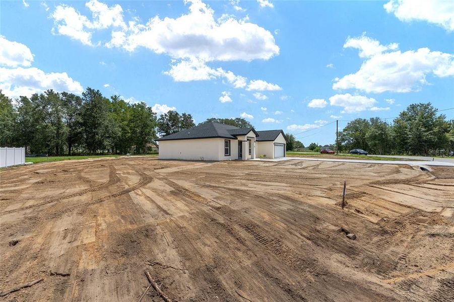 Front exterior of a new home in , Ocala, FL, highlighting curb appeal (Image 25). Front exterior of a new home in , Ocala, FL, highlighting curb appeal (Image 25).